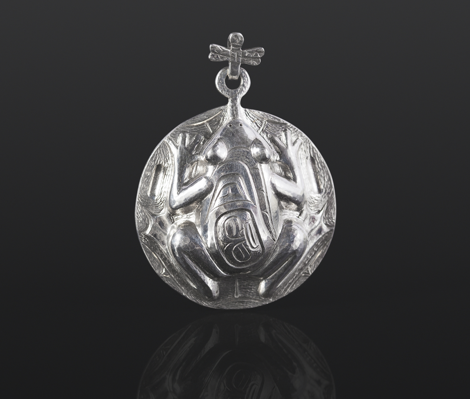the catch pendant dragonfly frog Gus Cook Kwakwaka'wakw silver Repoussé jewelry pendant native art northwest coast 2 x 1 1/2 1400