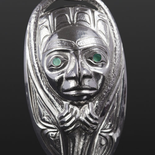 emergence pendant hawk transformation jade Gus Cook Kwakwaka'wakw abalone silver Repoussé jewelry pendant native art northwest coast