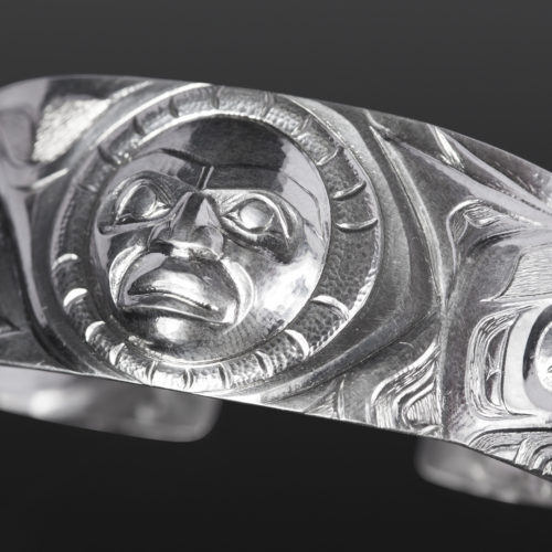 human and wolf bracelet custom stand Gus Cook Kwakwaka'wakw silver Repoussé jewelry native art northwest coast 6 1/4 x 1 2600
