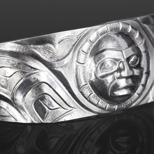 human and wolf bracelet custom stand Gus Cook Kwakwaka'wakw silver Repoussé jewelry native art northwest coast 6 1/4 x 1 2600