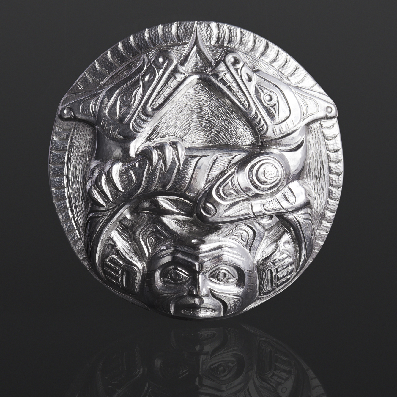 sisiutl pendant serpent wolf Gus Cook Kwakwaka'wakw silver Repoussé jewelry native art northwest coast 2 1/2 x 2 1/2 2800