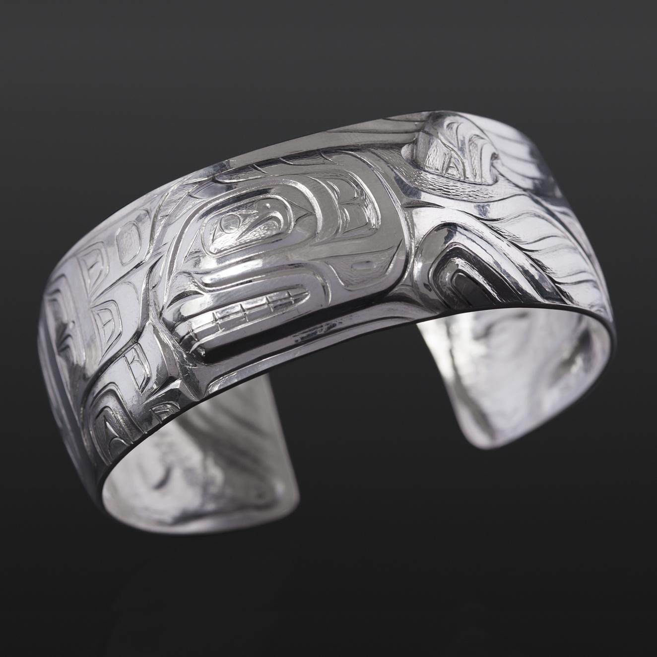 orca and thunderbird bracelet custom stand Gus Cook Kwakwaka'wakw silver Repoussé jewelry native art northwest coast 6 1/2 x 1 2600