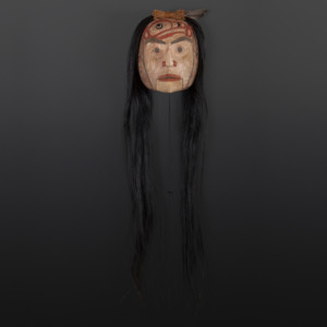 “Sgüüxs” Speaker Shawn Aster Tsimshian Alder, horse hair, abalone, paint 10" x 8” x 5" 36" with hair $3800