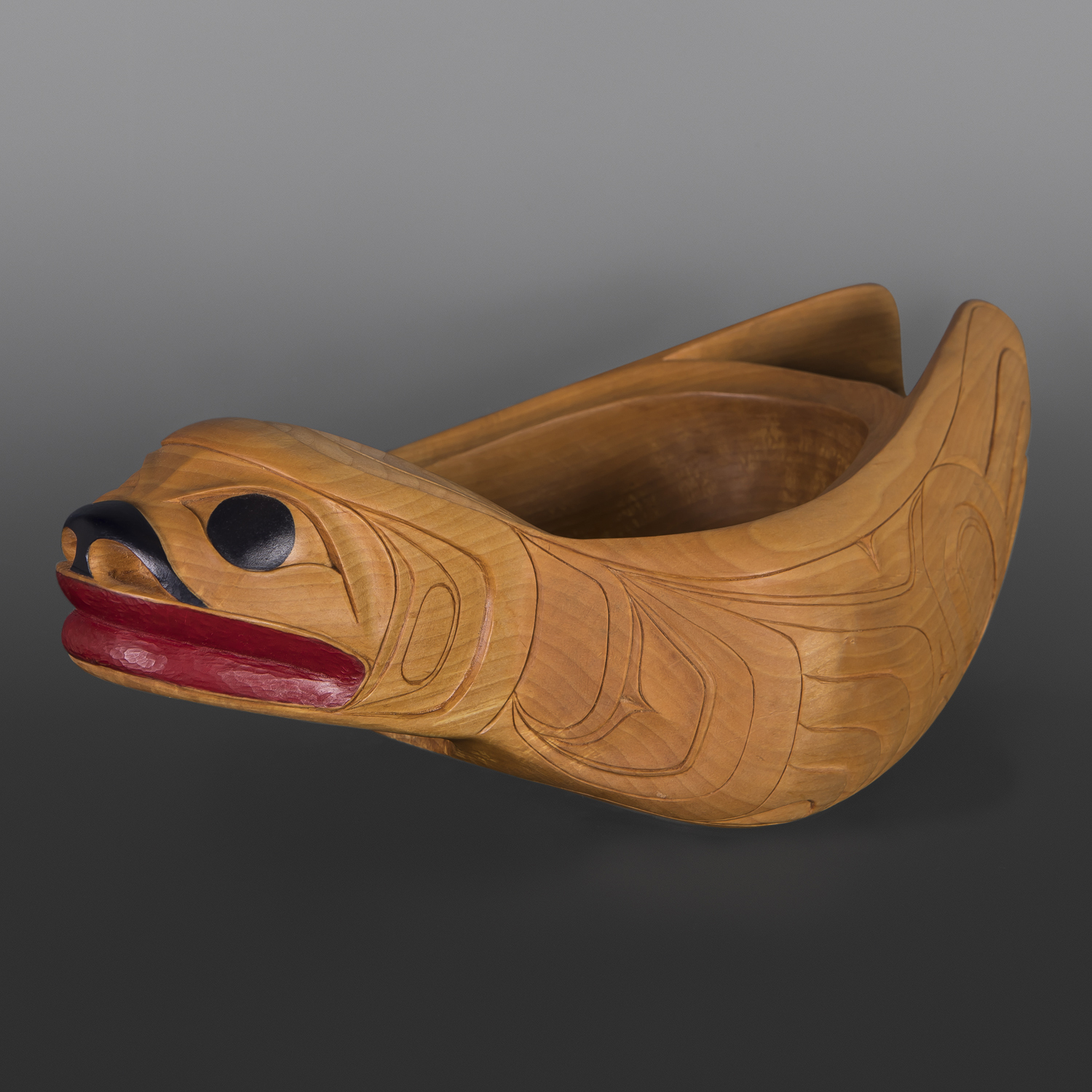 Spirit of the Seal Bowl
Carol Young Bagshaw
Haida
Alder, paint, custom stand
18" x 9" x 5" (24" tall with stand)
$7500