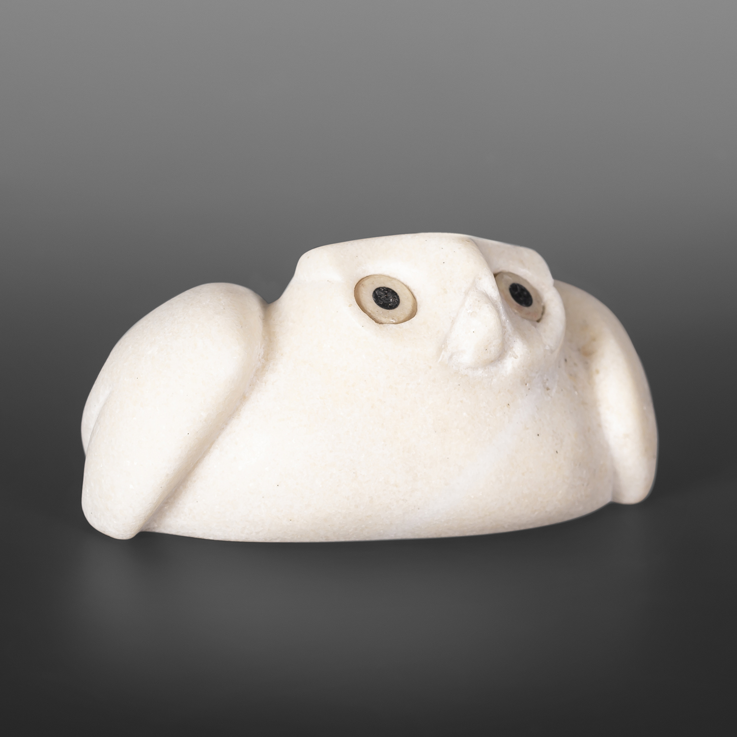 Little Owl
Joanasie Manning
Inuit
Arctic marble, bone #31
5½” x 3" x 2½”
$400
