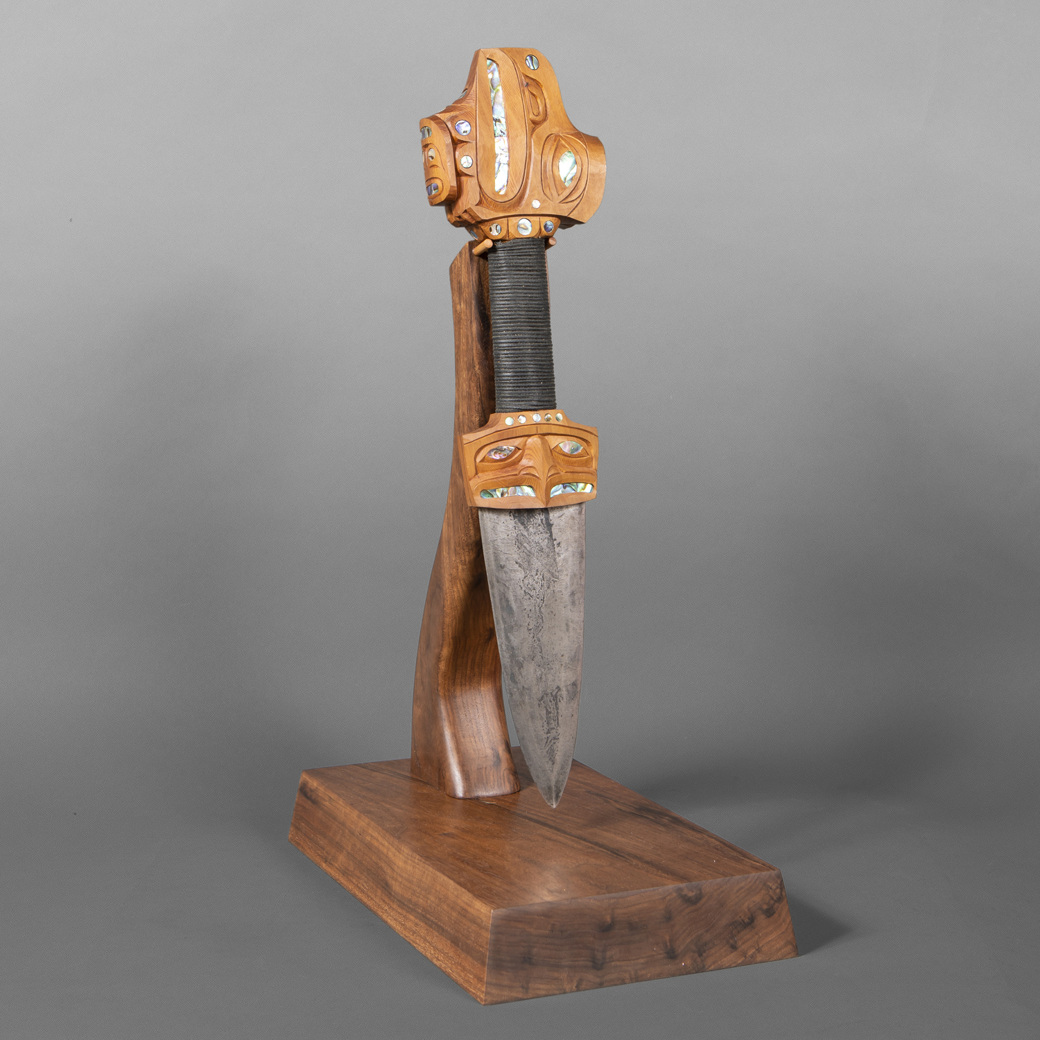 Ceremonial Dagger
Moy Sutherland
Nuu-Chah-Nulth
Red cedar, steel,  abalone, rope
Mahogany custom stand
16" x 4" x 4½"
19' x 12" x 7" (base)
$14000