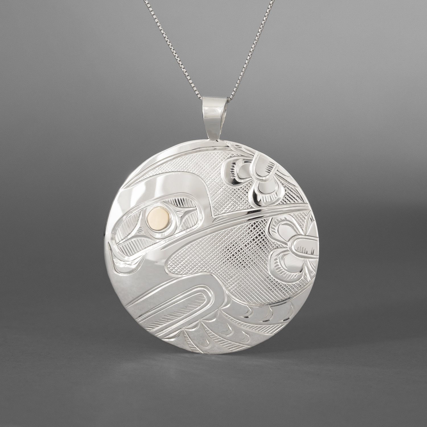 Hummingbird Pendant
Corrine Hunt
Kwakwaka'wakw/Tlingit
Sterling silver, 14k gold
2" dia.
$350