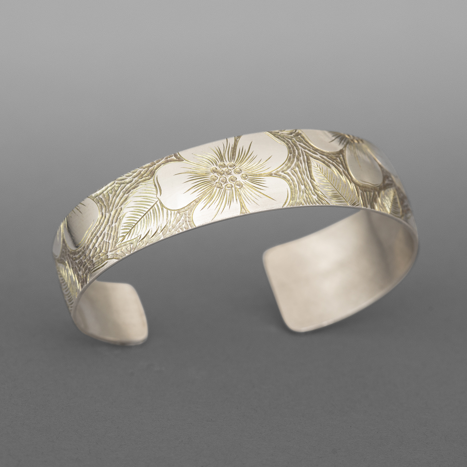 Wild Rose & Butterfly Bracelet
Jennifer Younger
Tlingit
Patinated sterling silver
6"x ¾”
$380