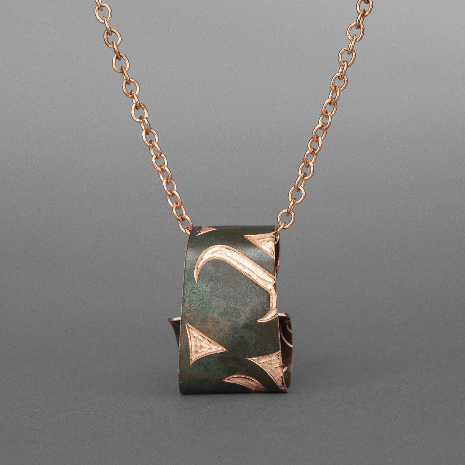 Monogrammed Ovoids Pendant
Jennifer Younger
Tlingit
Copper, copper chain
1"x ¾” pendant, 24" chain
$200