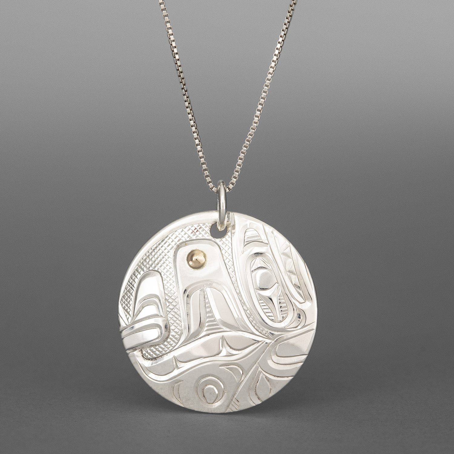 Killerwhale Pendant
Corrine Hunt
Kwakwaka'wakw/Tlingit
Sterling silver, 14k gold
1" dia.
$295