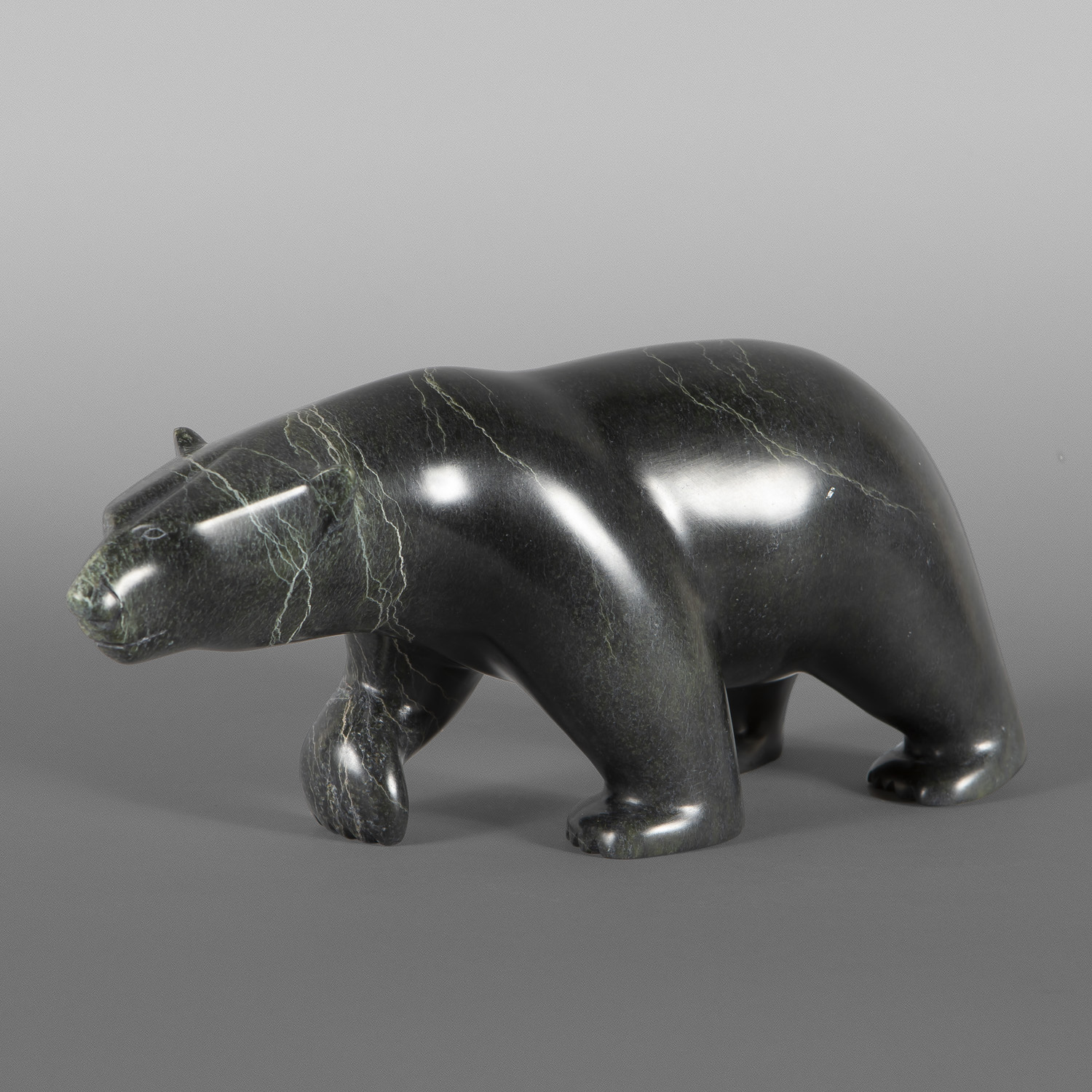 Walking Bear
Etidloie Adla
Inuit
Serpentine
11 ½” x 4” x 5”
$1400
