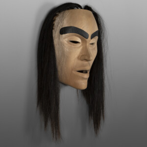 Storyteller
Raymond Shaw
Kwakwaka'wakw
Red cedar, horsehair
14" x 13" x 5½” (22" with hair)
$5800