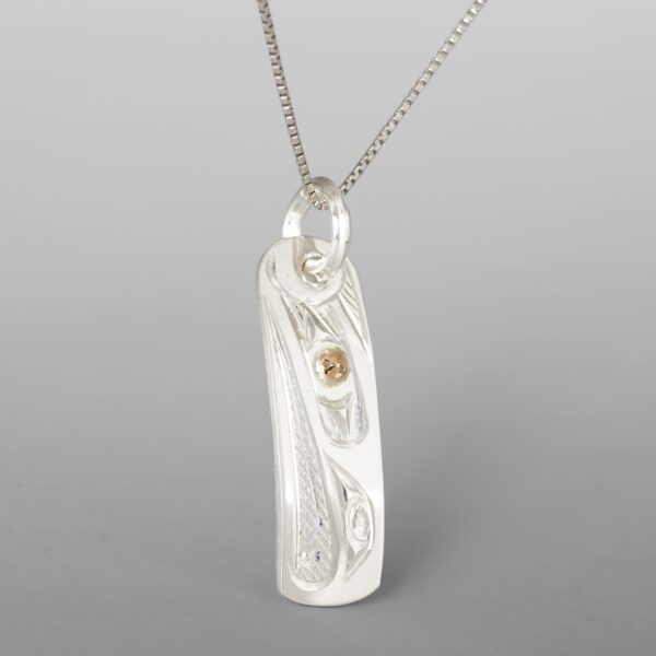 Golden Eyed Raven Pendant
