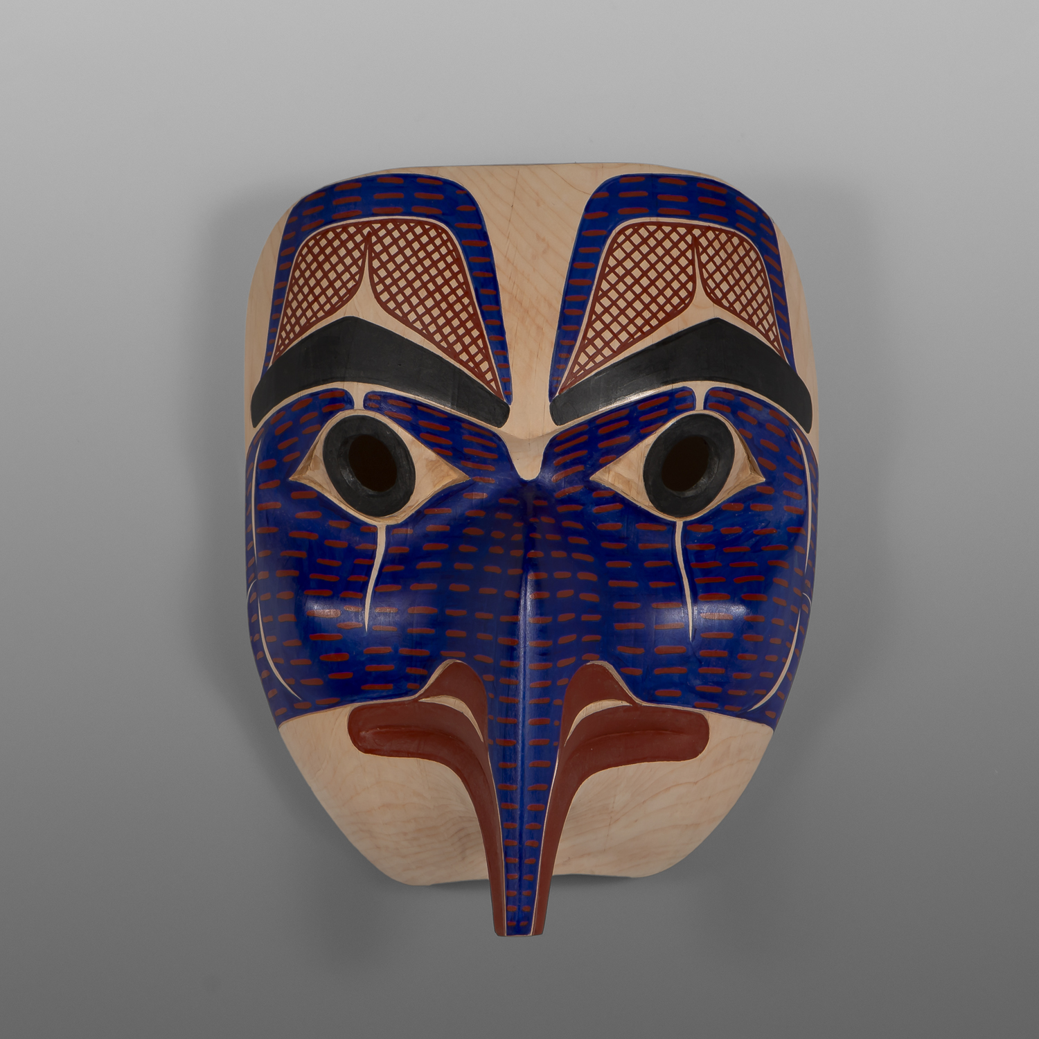 Ts’ymsyen Eagle Mask
David Boxley
Tsimshian
Alder, paint
12” x 9 ½” x 5”
5,000
