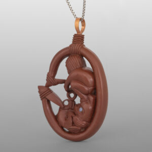 Human & Wolf Salmon Fishing Pendant
Gary Olver
Woodland Cree
Catlinite, abalone, copper, custom stand
1¾” x 1⅛” x ½” (4½" with stand)
2900