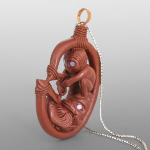 Human & Wolf Salmon Fishing Pendant
Gary Olver
Woodland Cree
Catlinite, abalone, copper, custom stand
1¾” x 1⅛” x ½” (4½" with stand)
2900