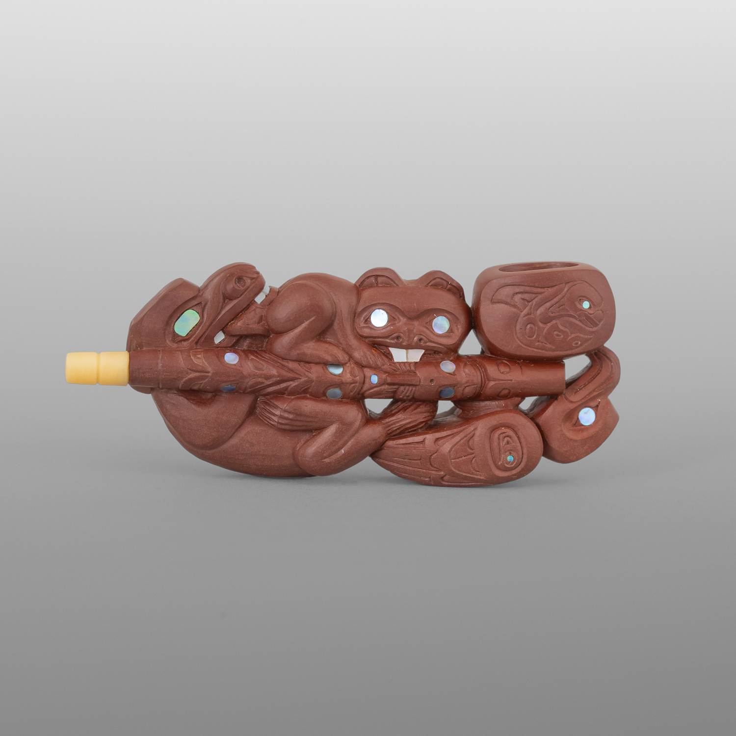 Wolf, Beaver & Eagle Pipe
Gary Olver
Woodland Cree
Catlinite, abalone, bone, custom stand
3” x 1¼” x ½” (2¾" with stand)
4500