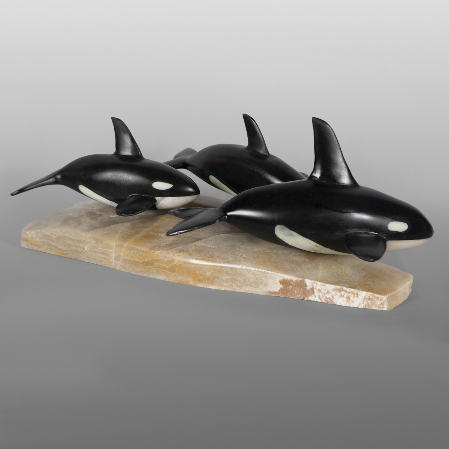 Killer Whale Family
Sam Dimmick
Inupiat
Chlorite, white alabaster, alabaster base
18" x 10" x 7"
2,600