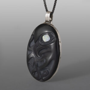 Octopus Pendant
Ernest Swanson
Haida
Argillite, abalone, silver
2" x 1"
1,650