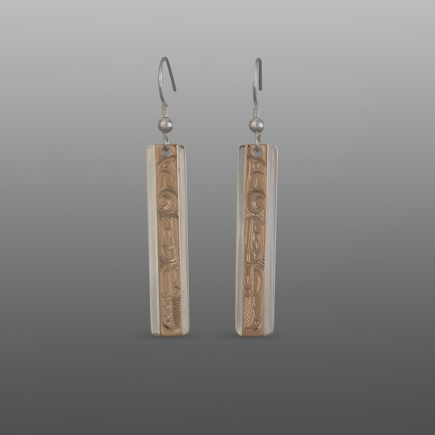 Orca Earrings
Lloyd Wadhams Jr
Kwakwaka'wakw
silver, 14k gold
1½" x ¼"
600