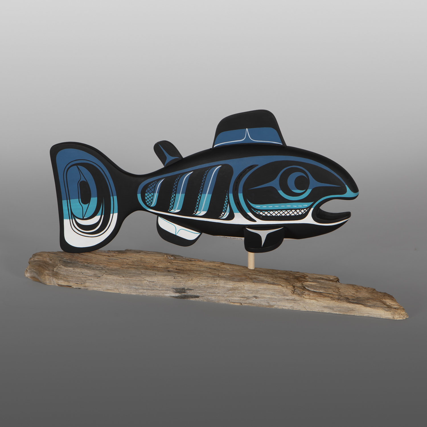 Swimming Salmon
Rod Smith - Thaelkualis
Oweekeno
Basswood, driftwood, paint
14" x 7" x 4½"
$900