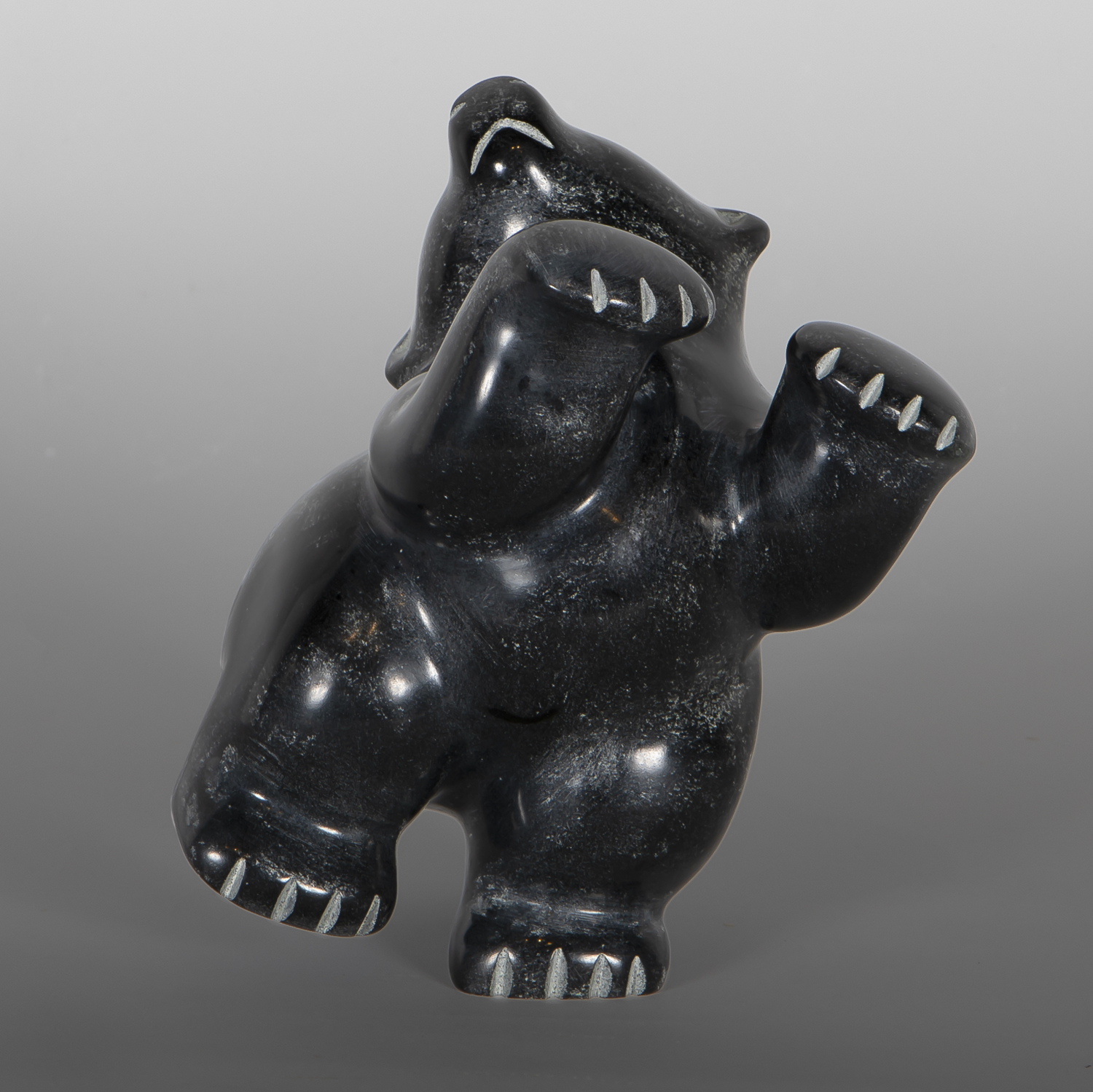 Haunched Bear
Markusie Papigatuk
Inuit
Serpentine
6½" x 4" x 4"
$1,600