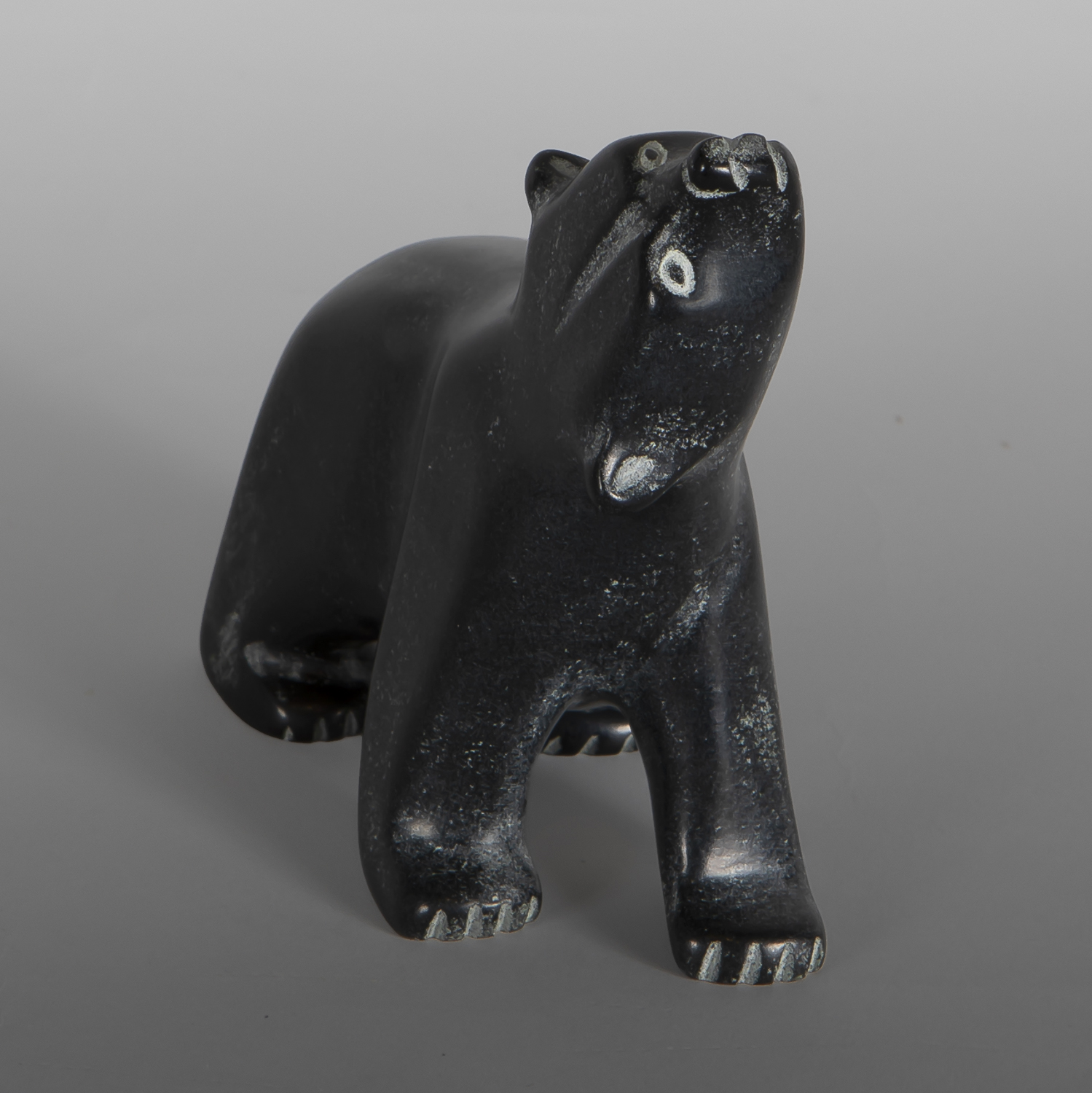 Watchful Polar Bear
Johnny Papigatuk
Inuit
Serpentine
4¼" x 4" x 2"
425