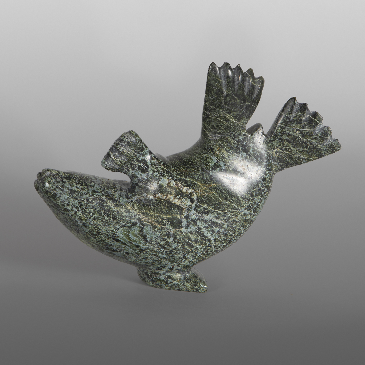 Playful Seal
Parr Parr
Inuit
Serpentine
8" x 5" x 2"
725