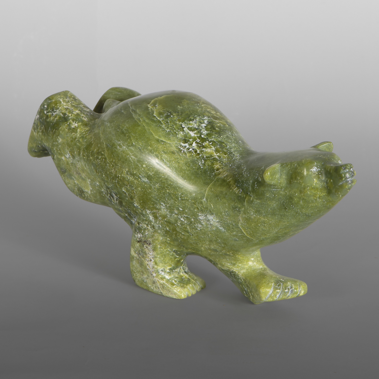 Diving Polar Bear
Parr Parr
Inuit
Serpentine
12" x 6" x 4"
$1,800
