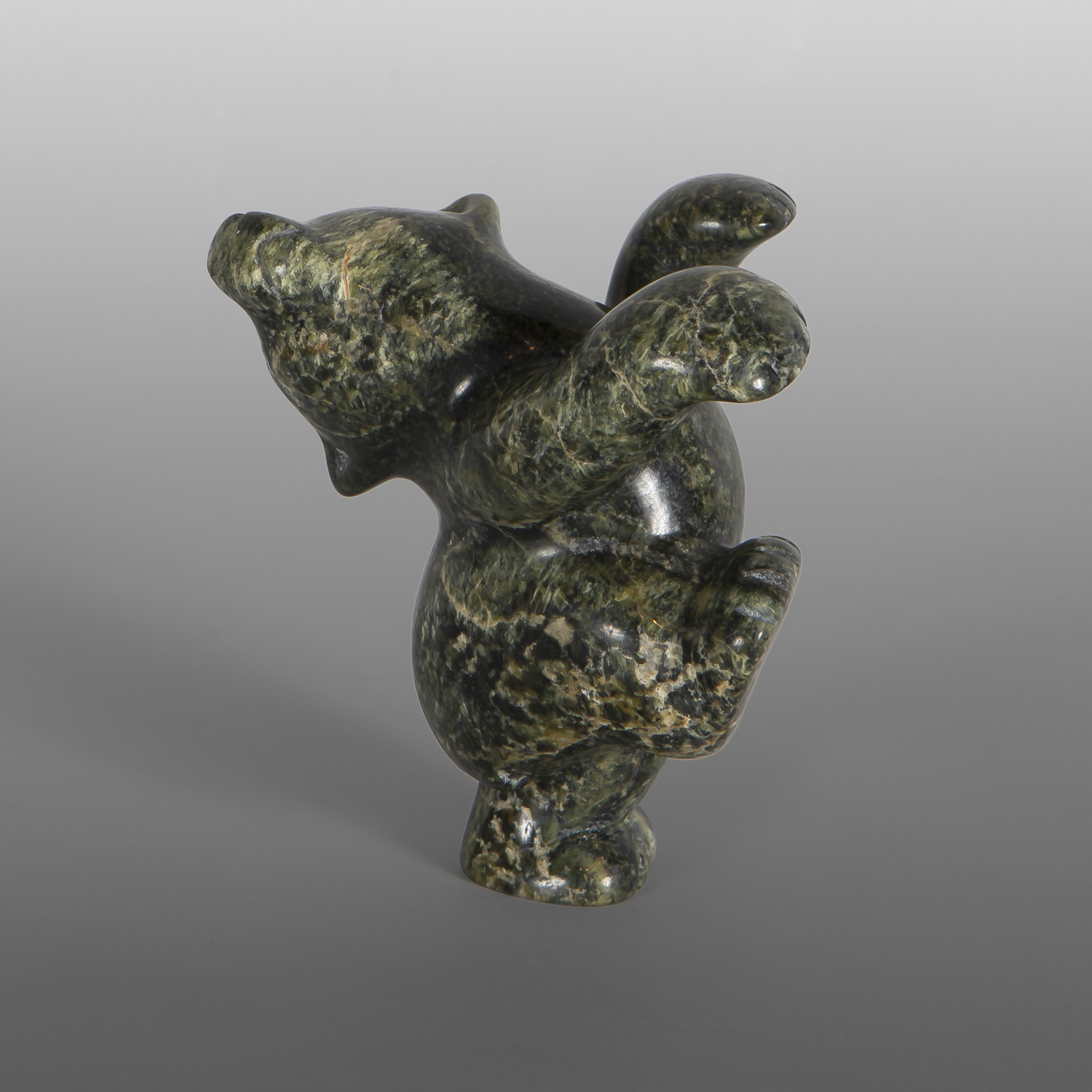 Joyful Polar Bear
Markusie Papigatuk
Inuit
Serpentine
4½" x 4" x 3¾"
$650