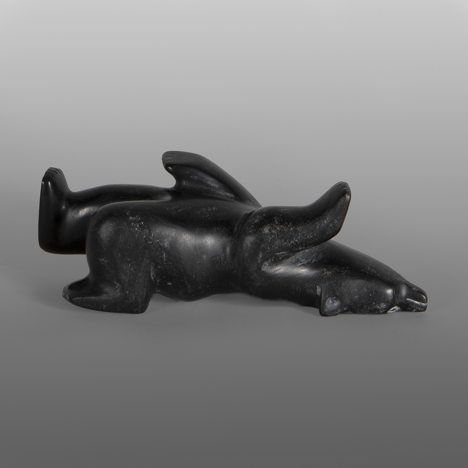 Reclining Bear
Palaya Qiatsuk
Inuit
Serpentine
7¼" x 3¼" x 2¾"
$700