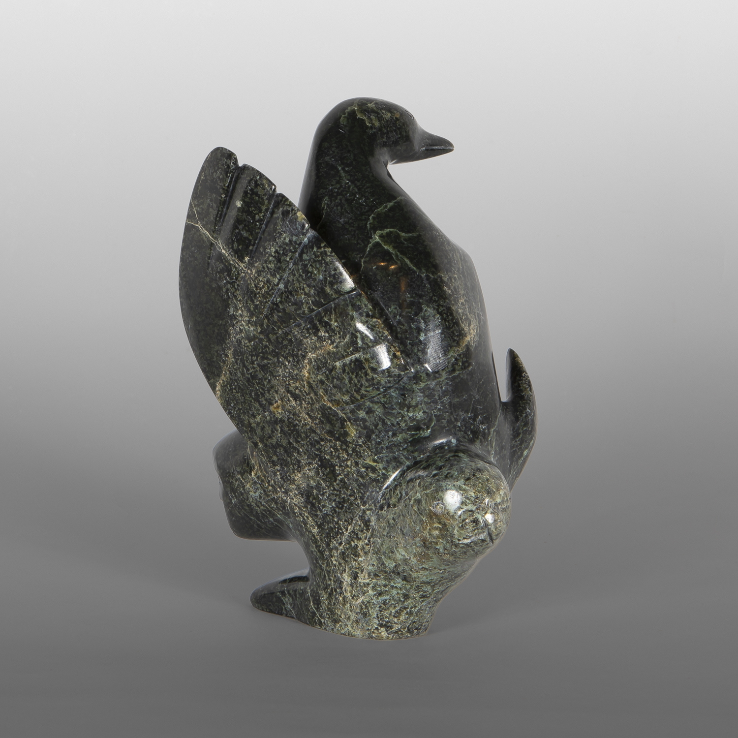 Sea, Land & Sky Transformation
Ningeosiaq Ashoona
Inuit
Serpentine
8¾" x 6¼" x 5"
$2,200