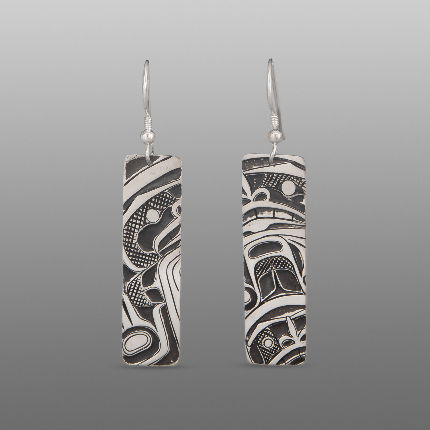 Human Earrings
Corey Moraes
Tsimshian
Silver
1½" x ⅜"
$750