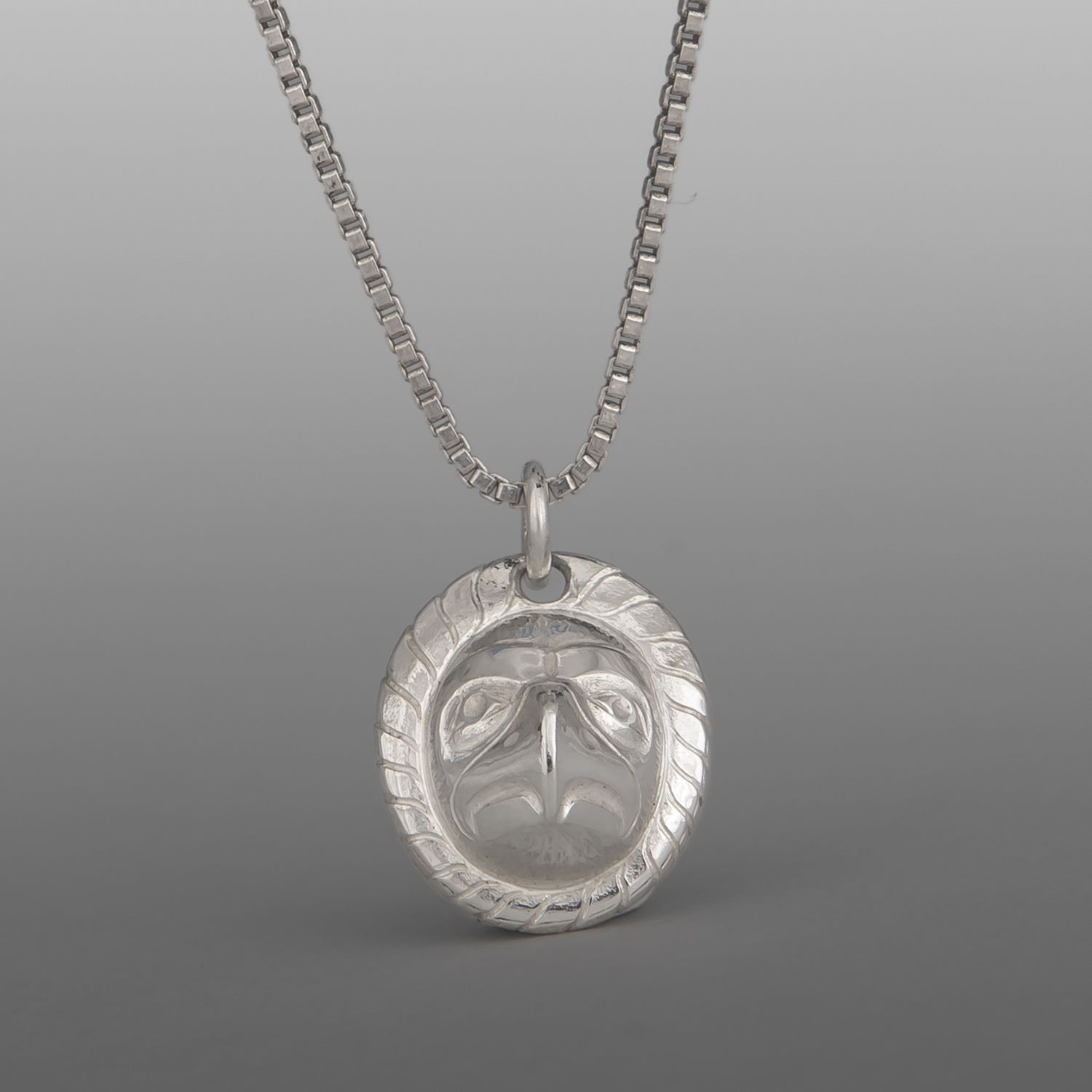Eagle Maskette Pendant
Gus Cook
Kwakwaka'wakw
Repoussé silver
⅝" x ½"
$450