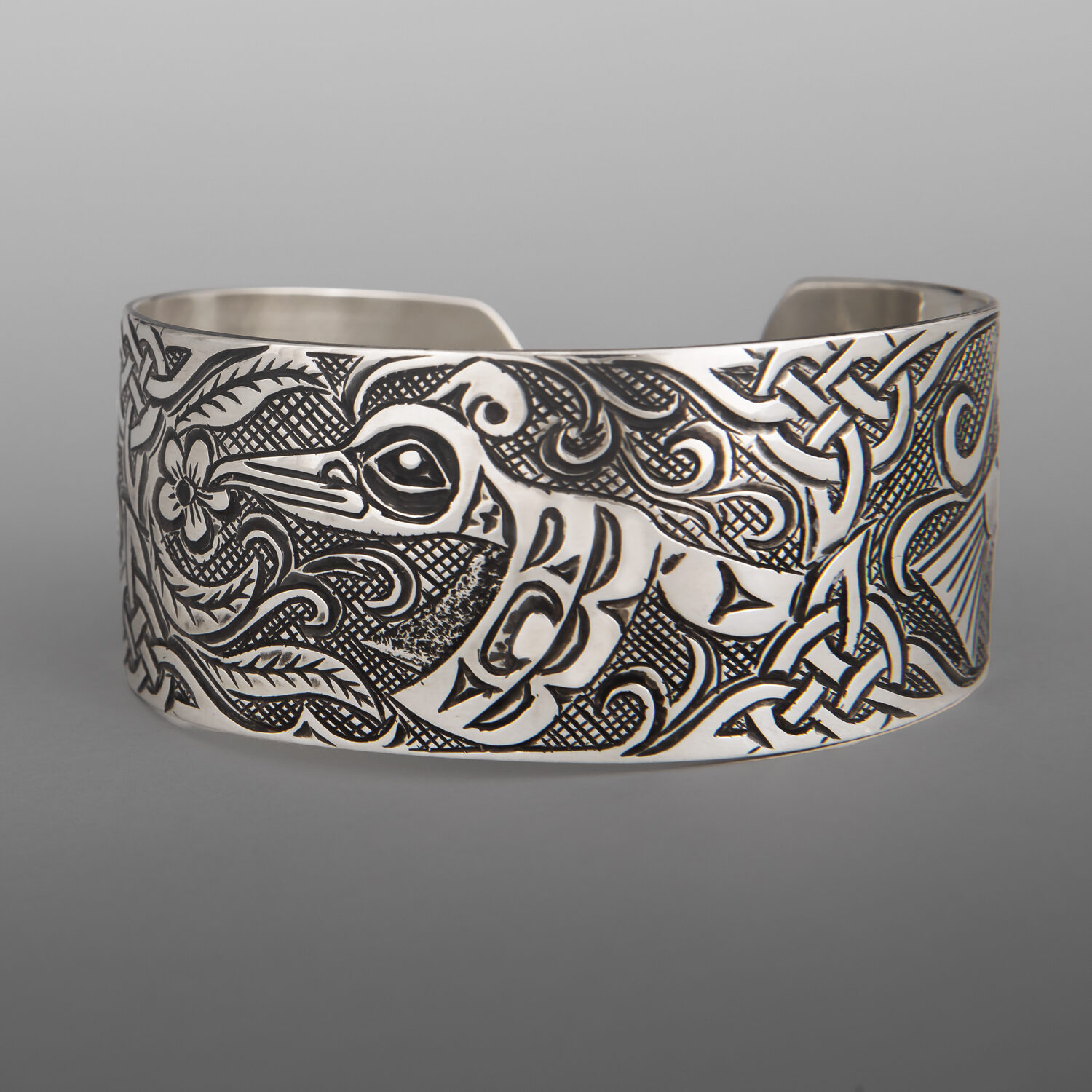 Hummingbird and Salmon Bracelet
Kelvin Thompson
Salteaux
Silver
6" x 1"
$900