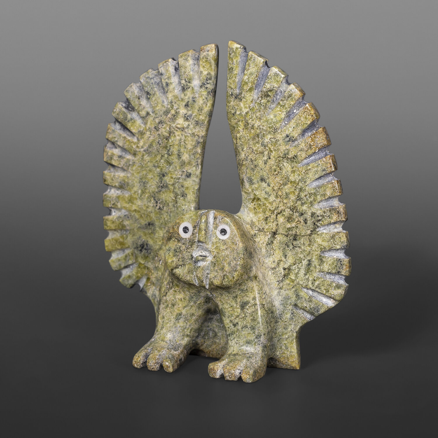 Jumping Owl
Palaya Qiatsuq
Inuit
Serpentine, bone #63
4" x 3½” x 1"