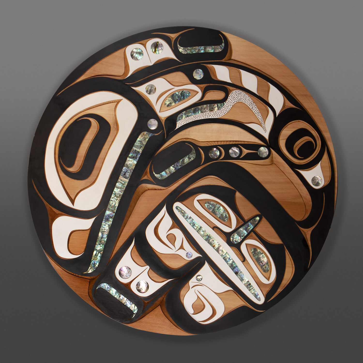 Killerwhale
Moy Sutherland
Nuu-Chah-Nulth
Redvcedar, abalone, paint
36" dia. x 2"
$9800