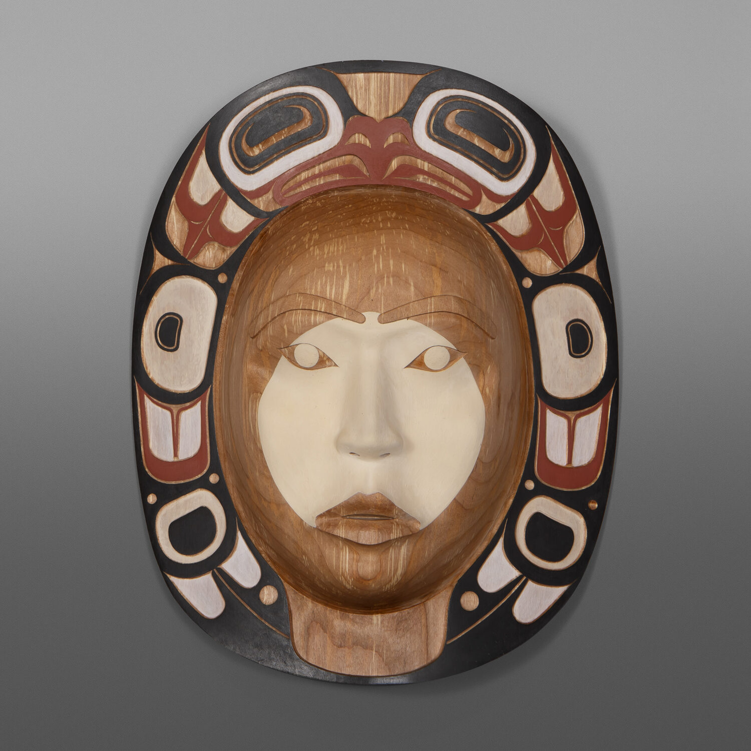Gyemgaatk Moon
Shawn Aster
Tsimshian
Alder, paint
13½” x 10¾” x 4”
$6400