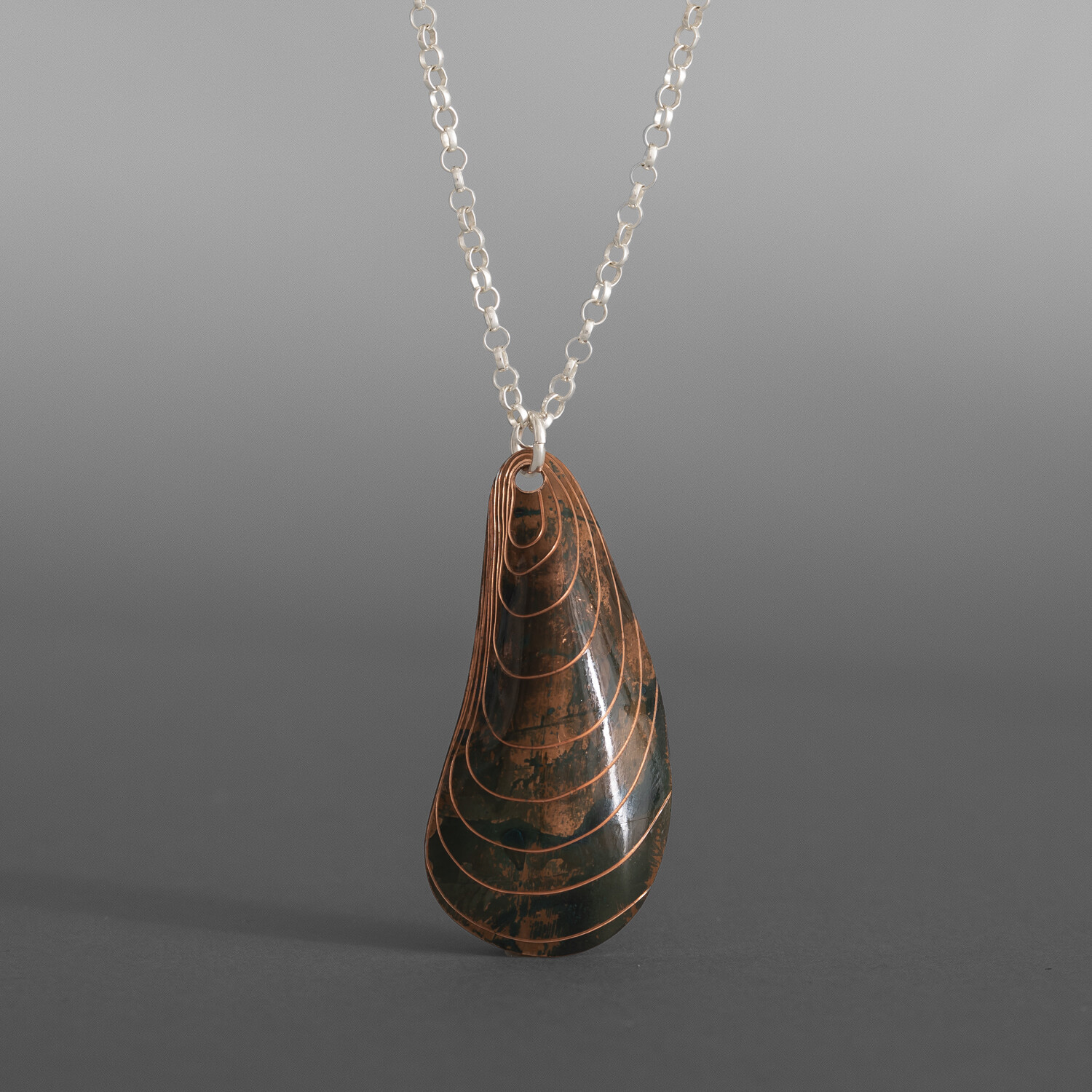 Mussell Shell Pendant
Jennifer Younger
Tlingit
Copper, silver chain