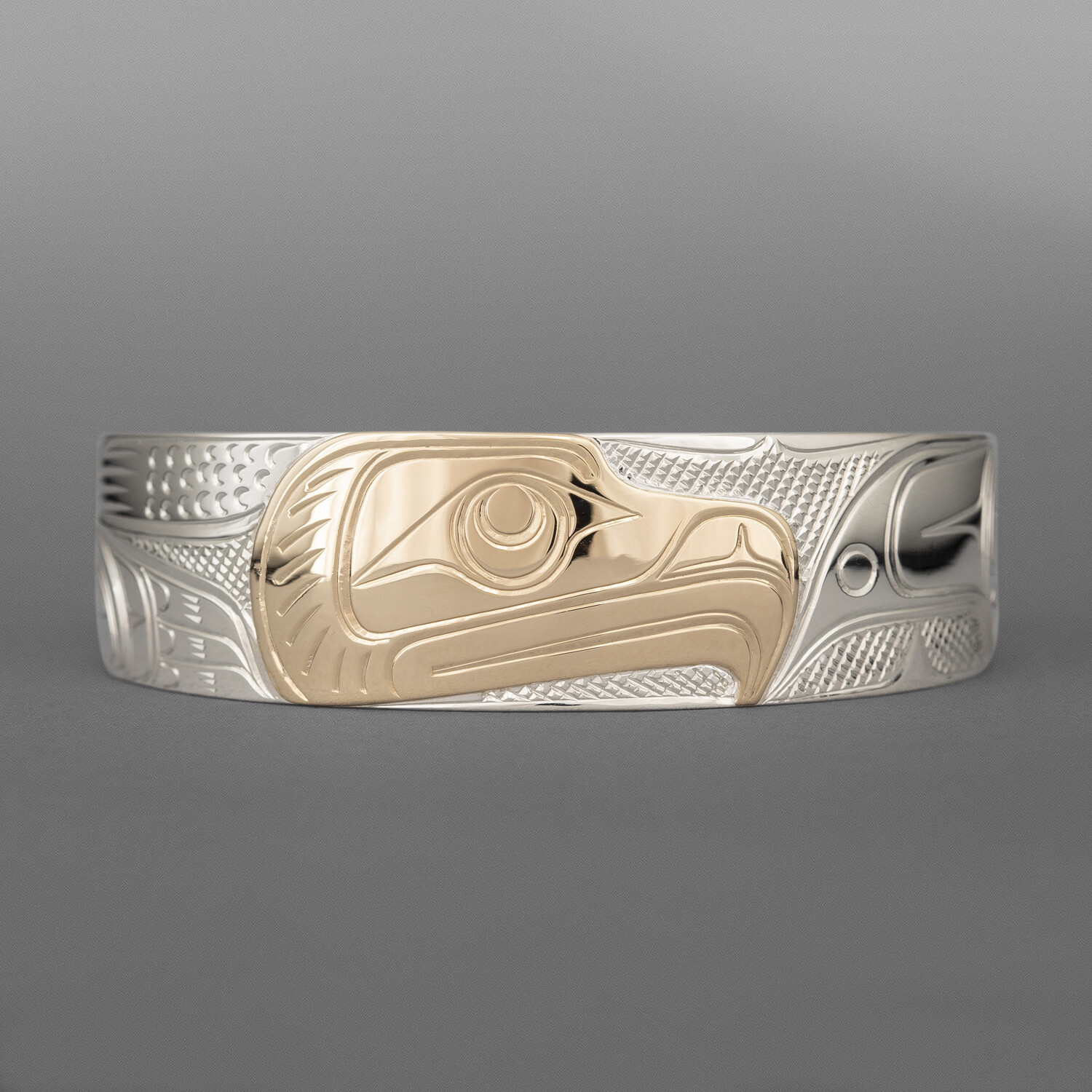 Eagle Bracelet
Lloyd Wadhams Jr
Kwakwaka'wakw
Silver, 14k gold
6" x ¾”
$1100