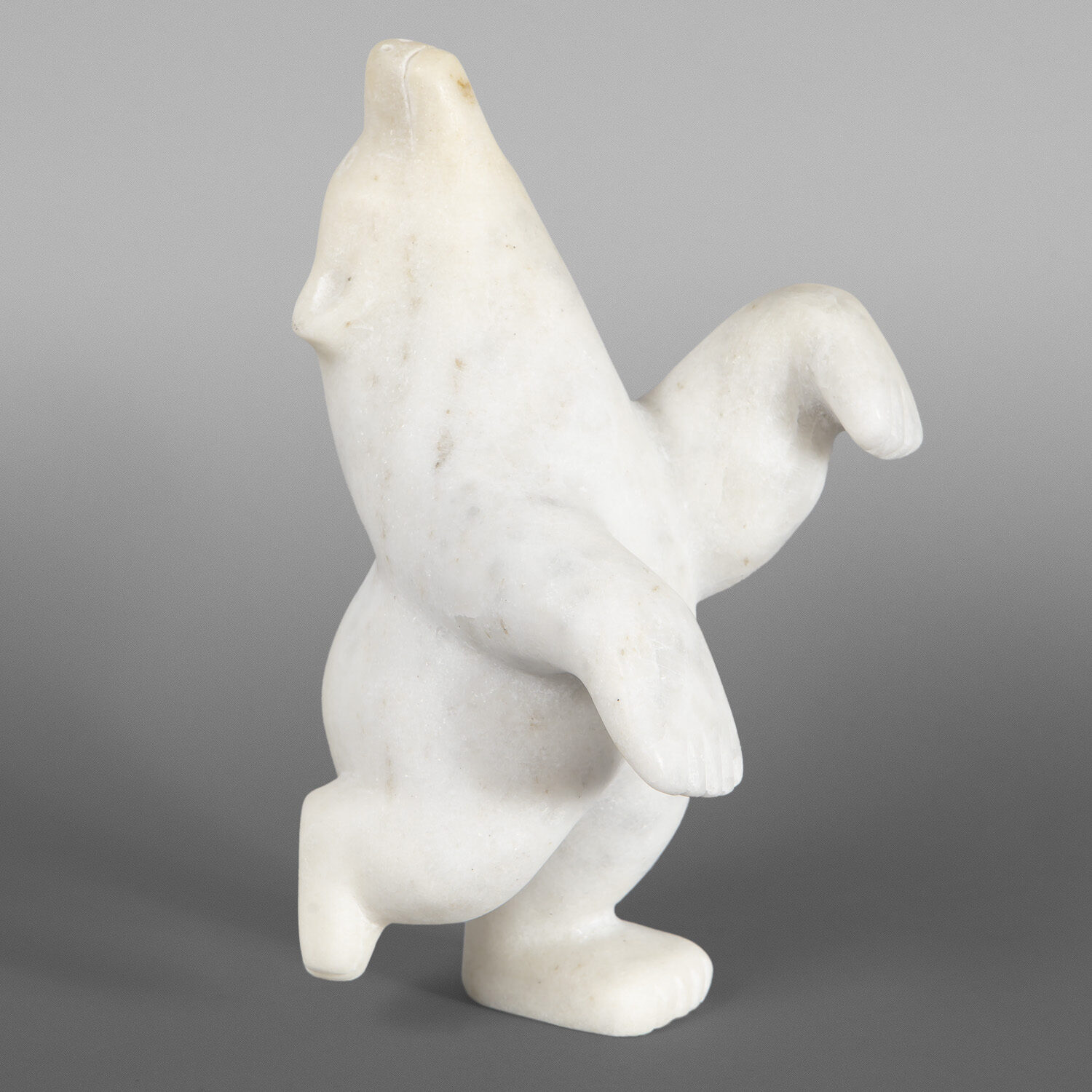 Dancing Bear
Adamie Mathewsie
Inuit
Arctic marble
9 ½” x 5 ½” x 5”
$1400
