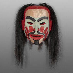 Warrior Shaman MaskRaymond Shaw
Kwakwaka'wakwRed cedar, horsehair, paint
14" x 11" x 6” (22" with hair)$6000
