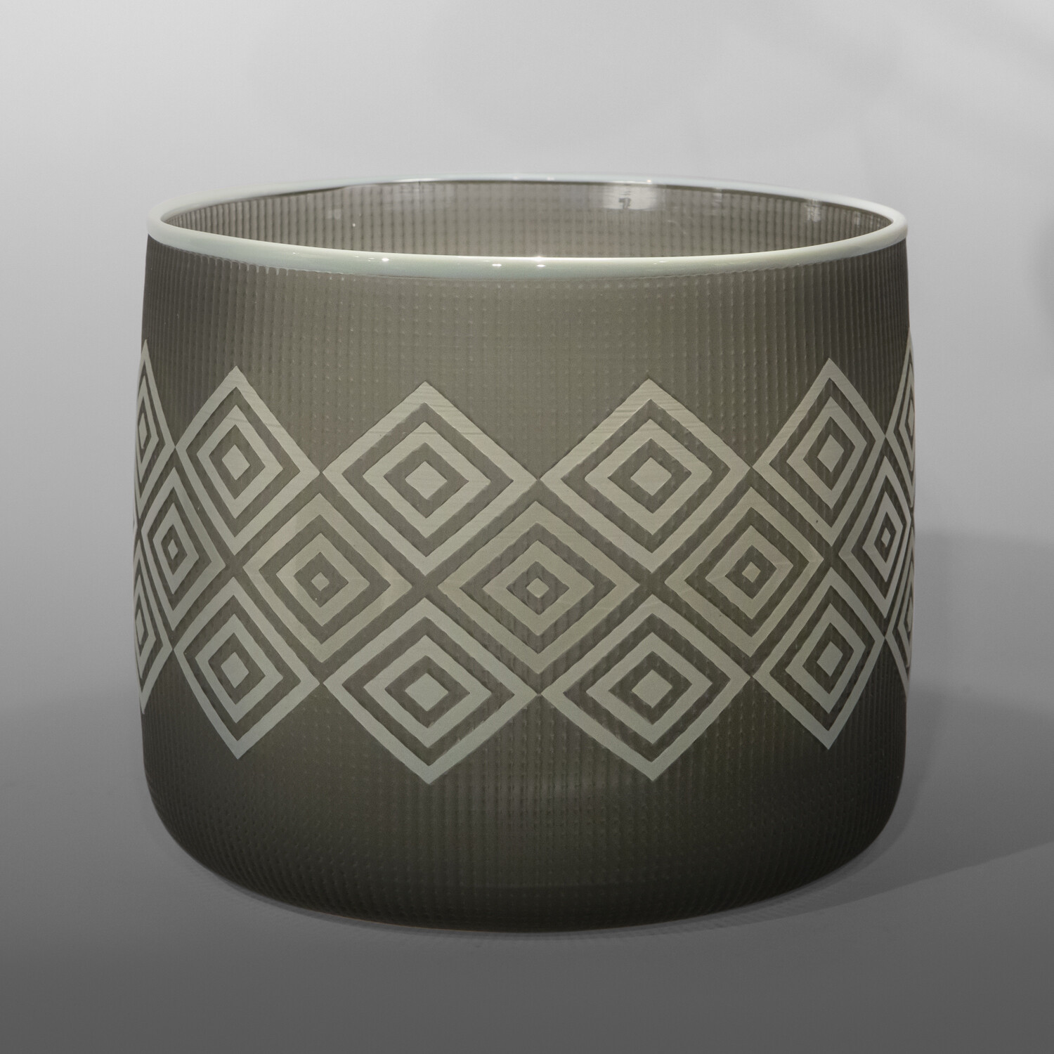 Fog Grey Basket
Preston Singletary
Tlingit
Blown and sand-carved glass
8½” dia. x 7"
$8000