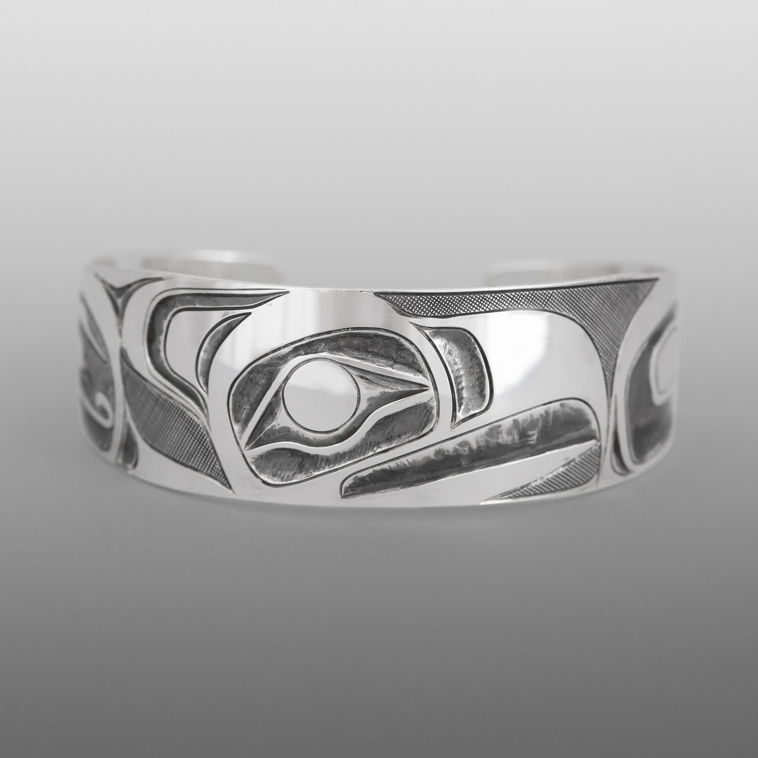 Silver Thunderbird Bracelet
Landon Gunn
Kwakwaka'wakw
Oxidized silver
6" x ¾"
$800