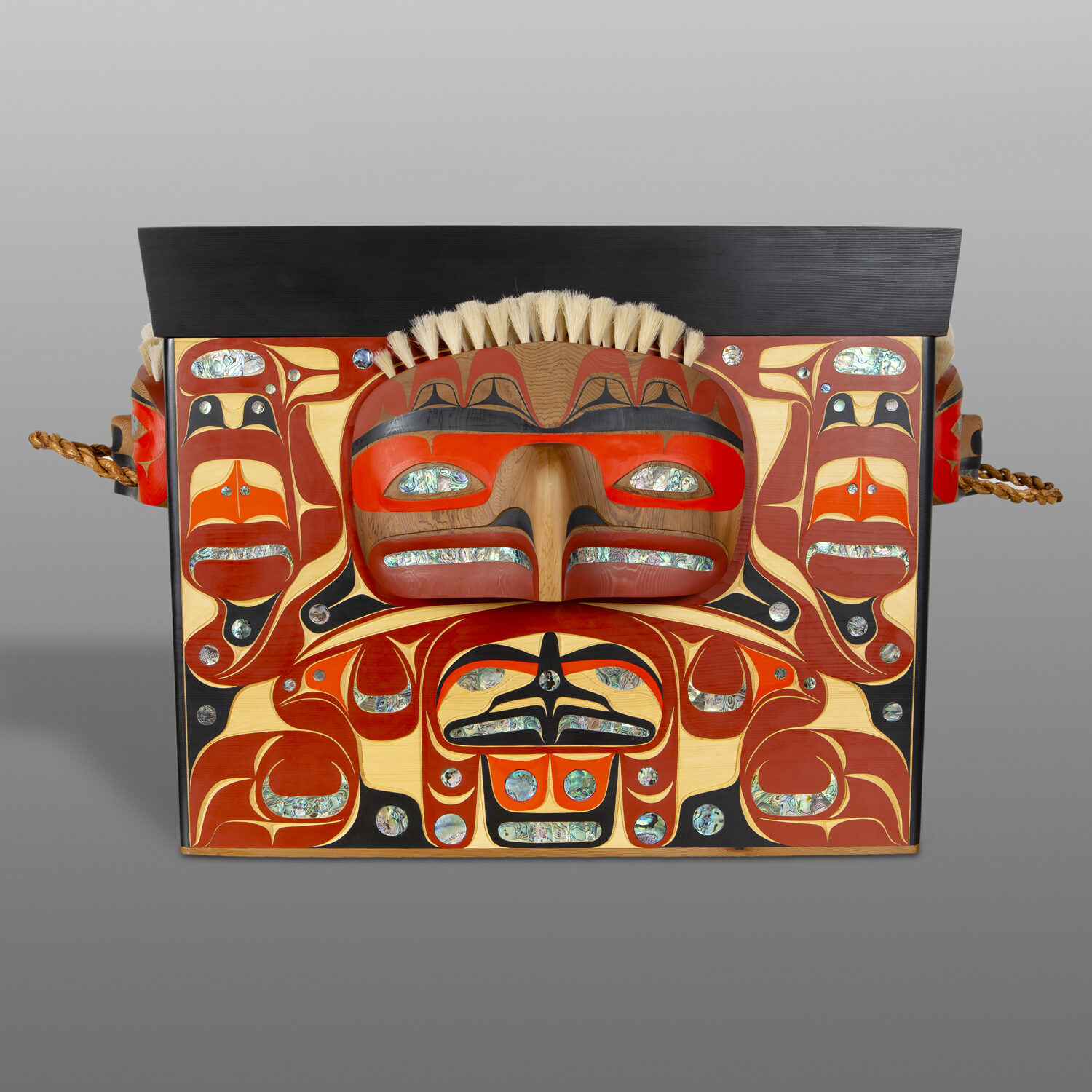 Box of Storms
Moy Sutherland
Nuu-chah-nulthYellow cedar, red cedar, abalone, horse hair, red cedar masks, red cedar bark rope, acrylic paint
30" x 23" x 48"$44000