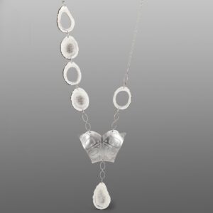 Wood Grain Butterfly Necklace
Jennifer Younger
TlingitSterling silver, antler
3¾" x 2½"
$2000
JY6
Total length 22" w/ 32" chain