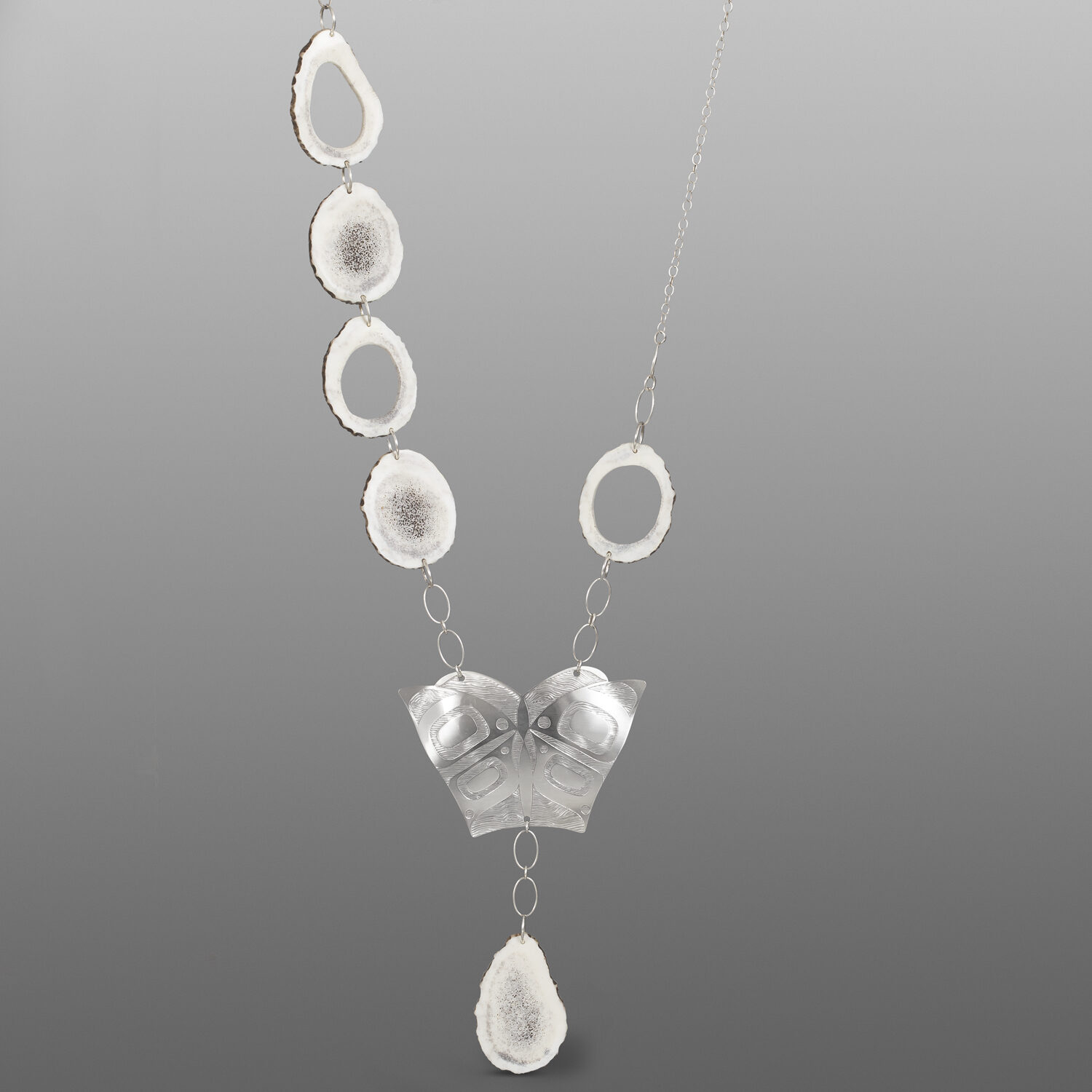 Wood Grain Butterfly Necklace
Jennifer Younger
TlingitSterling silver, antler
3¾" x 2½"
$2000
JY6
Total length 22" w/ 32" chain