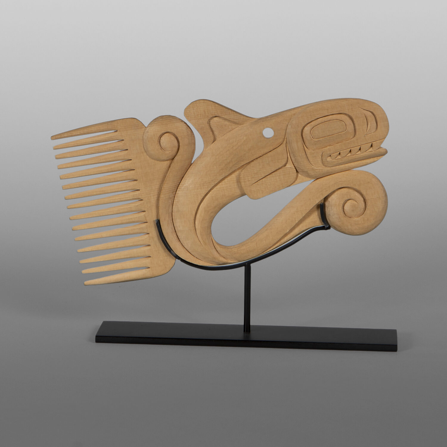 Orca Flow Comb
Dean Hunt
Heiltsuk
Yellow cedar, custom stand
8” x 6” x ½”
$1800
