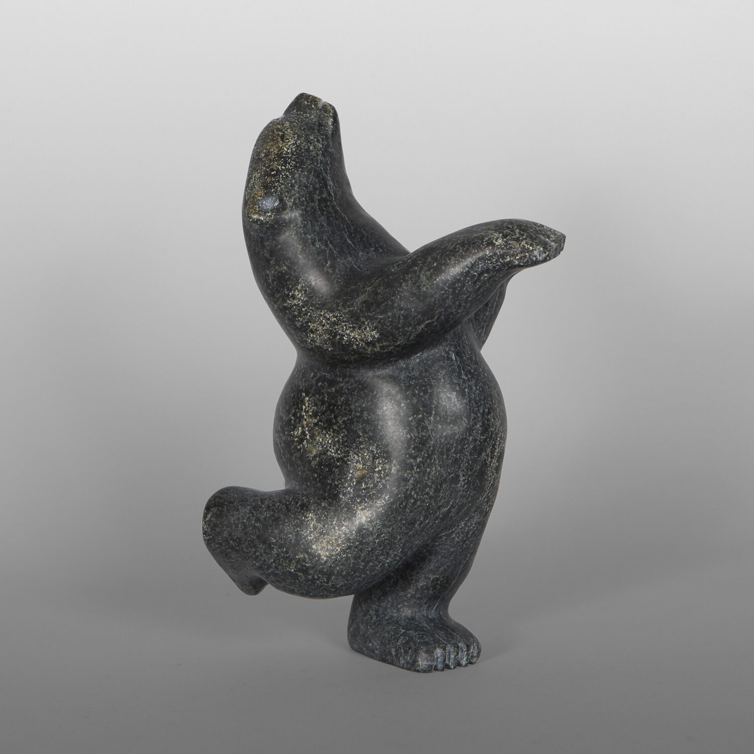 Dancing Polar Bear
Palaya Qiatsuk
Inuit
Serpentine
5½" x 8" x 3½"
1,400