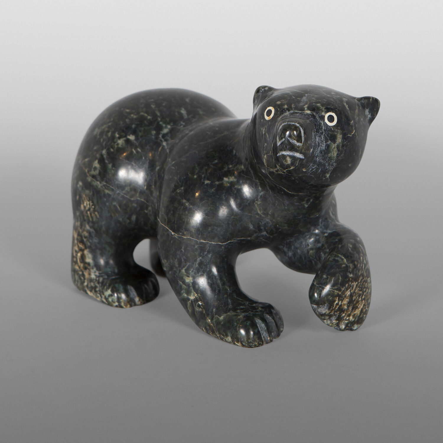 Curious Bear
Toonoo Sharky
Inuit
Serpentine
7" x 4" x 4½"
1,500